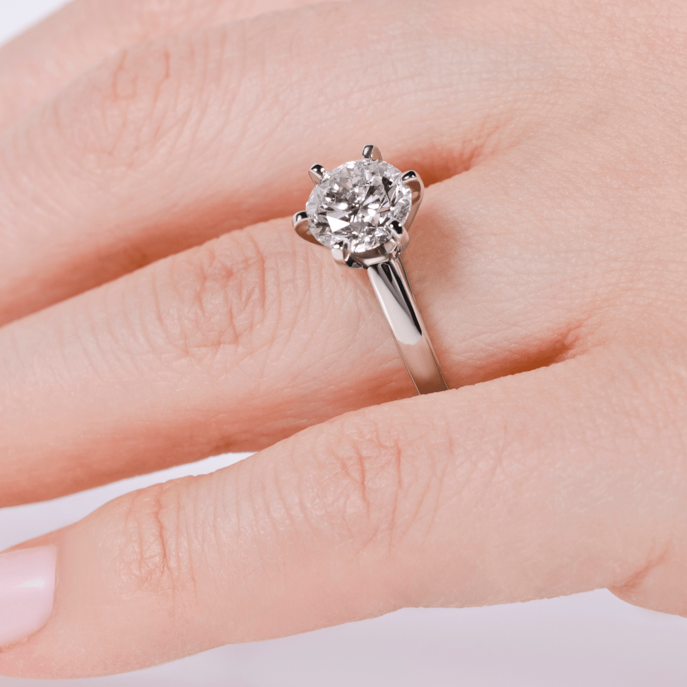 Close-up of 2 carat solitaire lab-grown diamond engagement ring in 14K gold — sizes $4, 4.5, 5, 5.5, 6, 6.5, 7, 7.5, 8, 8.5, 9, 9.5, 10$