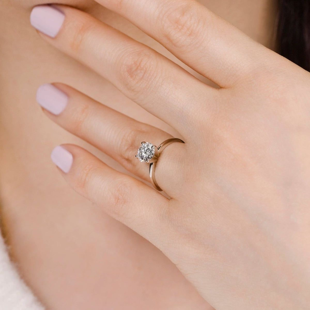 1ct lab-grown diamond ring — side angle on hand in sizes $5, 5.5, 6, 6.5, 6.75, 7, 8$