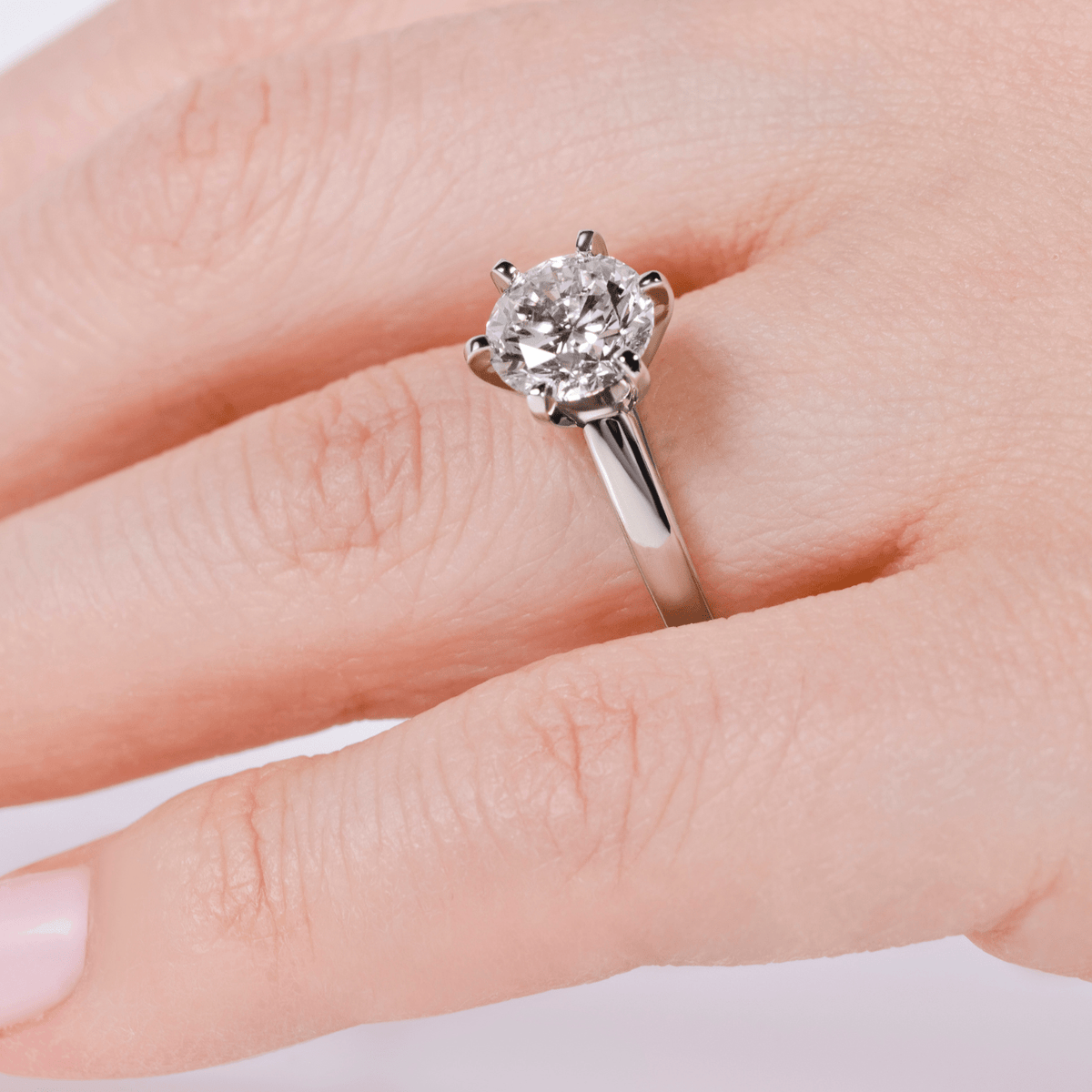 Close-up of 2 carat solitaire lab-grown diamond engagement ring in 14K gold — sizes $4, 4.5, 5, 5.5, 6, 6.5, 7, 7.5, 8, 8.5, 9, 9.5, 10$